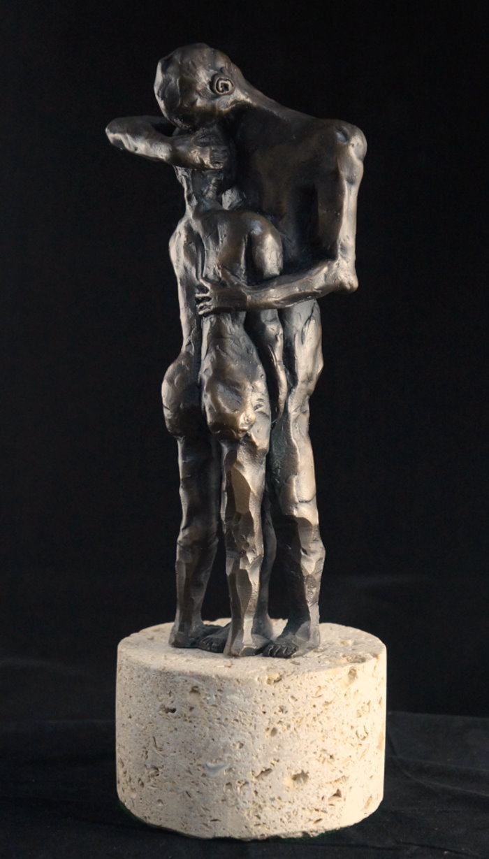 two figures-embracing